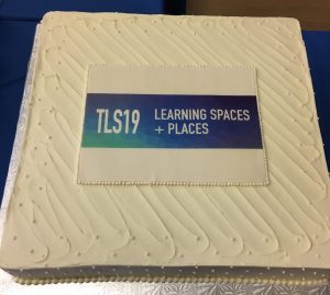 alt= photo of cake with TLS 2019